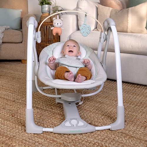 Ingenuity baby swing Cozy Spot portable with toy bar and music