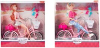 Lauren Modepop op Fiets met Accessoires
