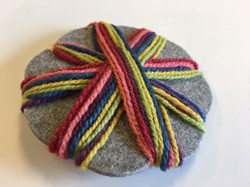 Filges braiding flower toy made of organic wool with plant decoration